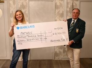 Golf club captain raises thousands to keep suicide prevention hotline