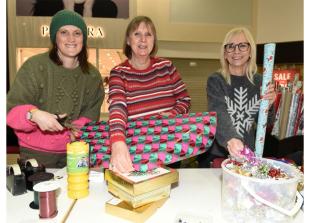 Volunteers wrap gifts in Maidenhead's Nicholsons Centre to raise funds for Thames Hospice