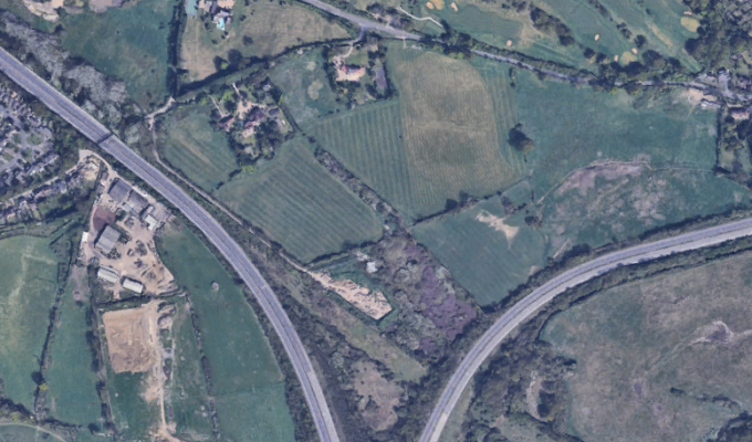 Land south of Harvest Hill Road.