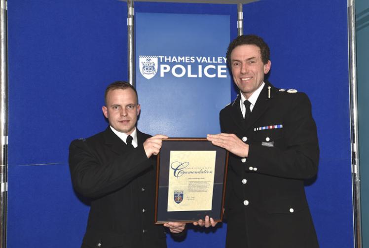 Police officer who had 'firearm' pointed at him is commended for 'exceptional bravery'