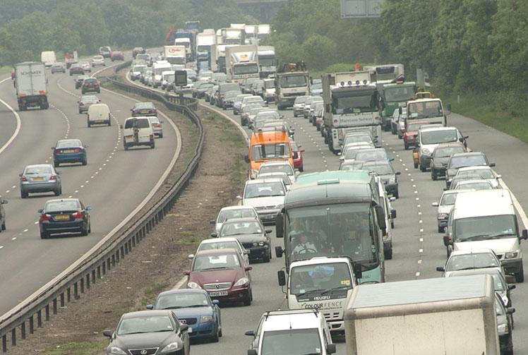 Warning of delays following overturned vehicle on the M4