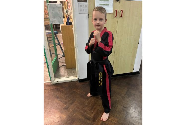 Cookham boy, 9, says achieving black belt in mixed martial arts felt 'like paradise'