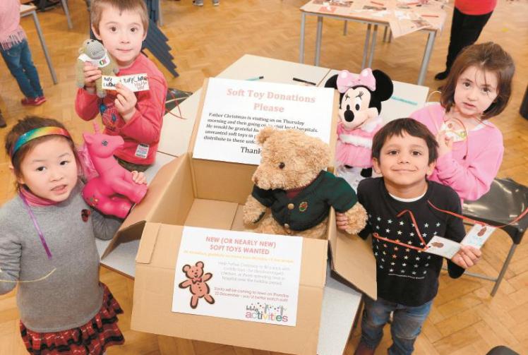 Claires Court holiday club children donate gifts