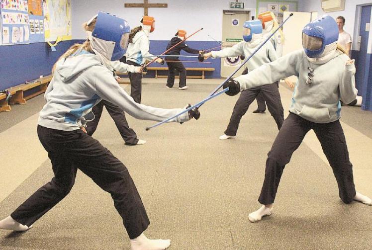Wargrave Senior Section guides practice fencing skills Photo 1 of 1