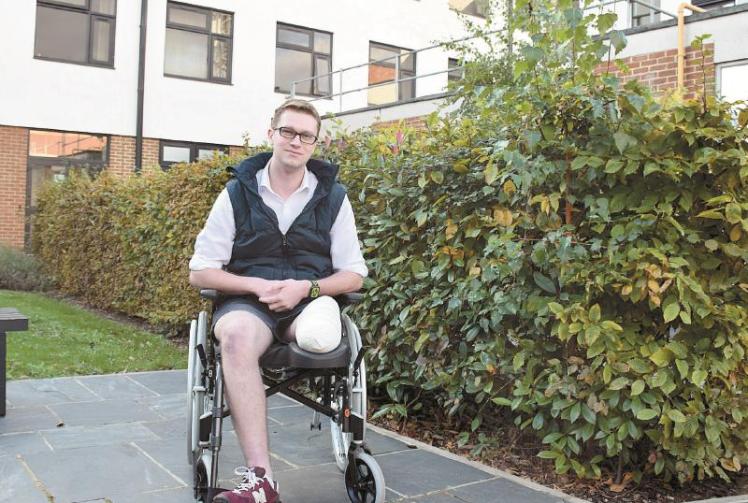 Police officer who lost leg after collision says he owes his life to passer-by who applied tourniquet