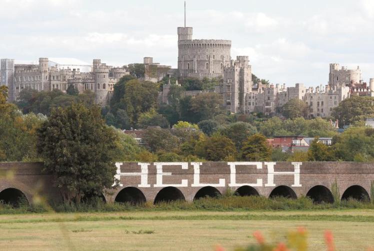 'HELCH' graffiti tag appears on railway viaduct overlooking Windsor Castle