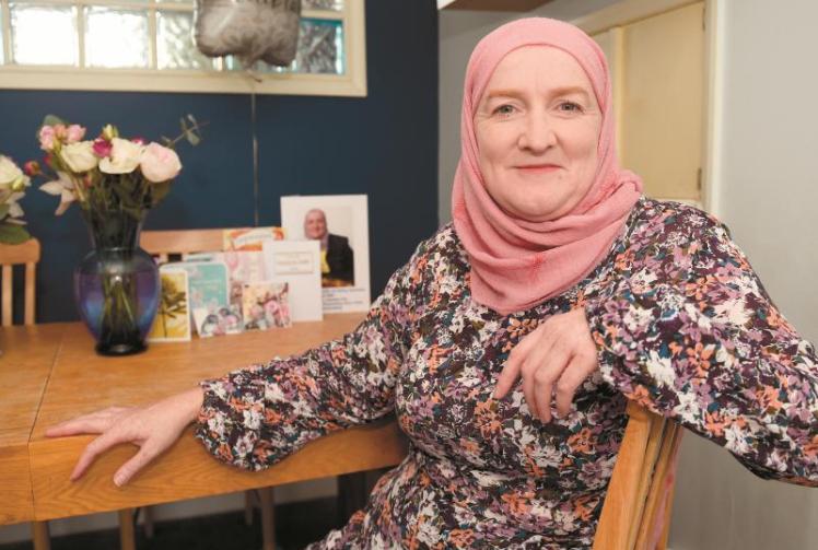 Community campaigner receives MBE for work bringing different faiths together