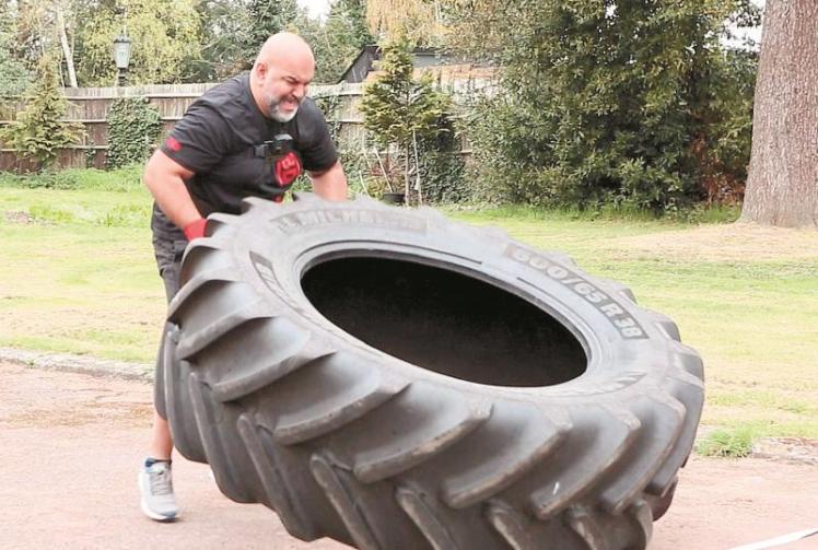 British Sumo Wrestling champion flips his way to unofficial fitness world record