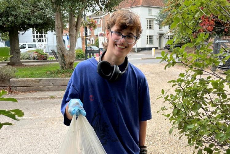 Student who cleans up on woodland and river walks