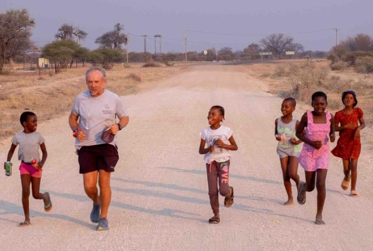 Runner writes book about record-breaking adventure