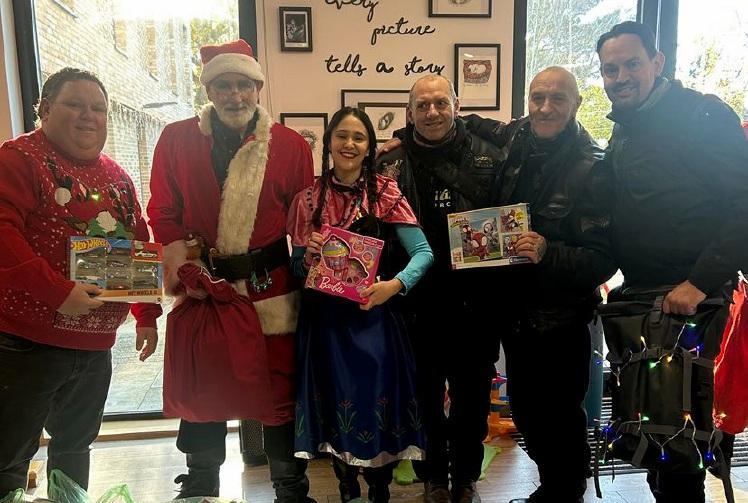 Motorcyclists deliver Christmas presents to sick children