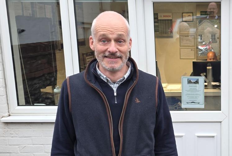 From houses to cars for service station owner