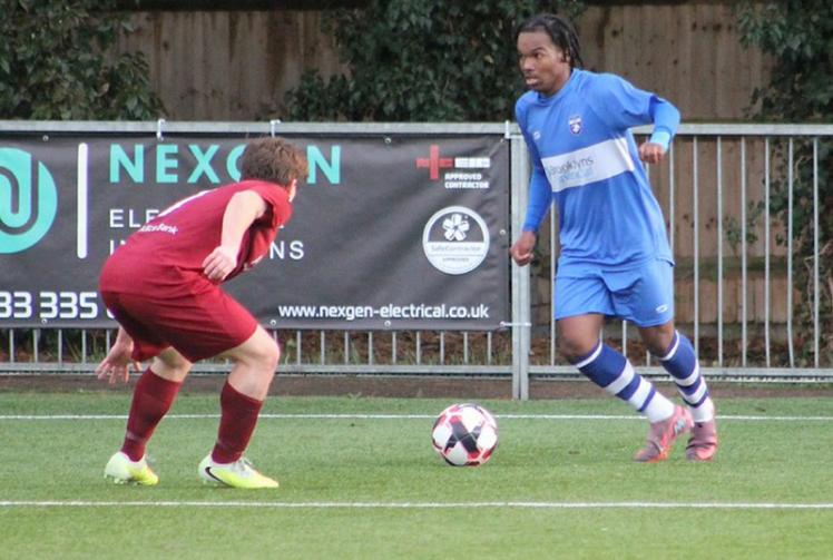 Burnham edge seven-goal thriller at Ashford Town to stay top of the table